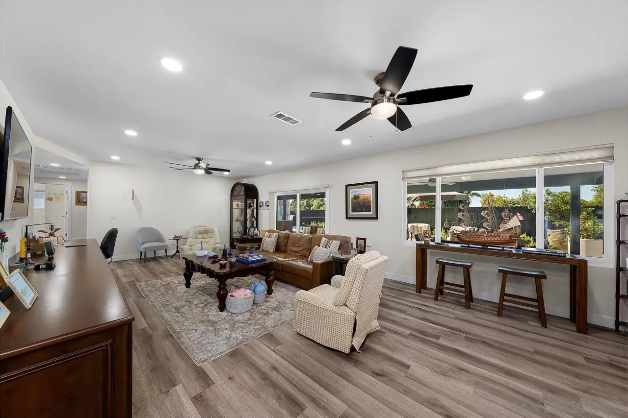 1761 Harvard Street Chula Vista, CA 91913 - Photo 9 of 41 a living room with furniture and a large window