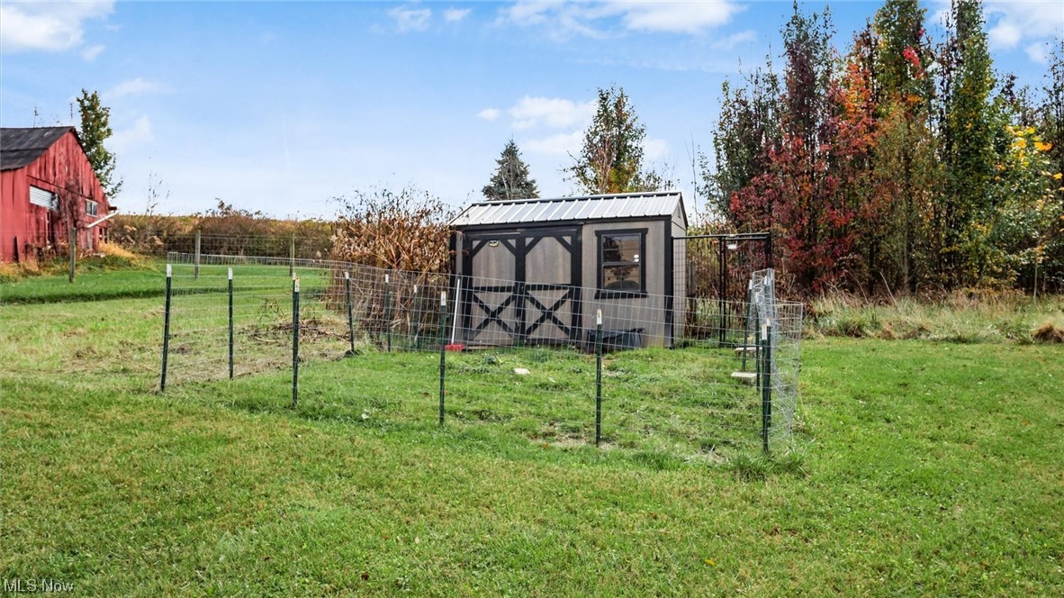1730 Mollies Rock Road Dresden, OH 43821 - Photo 23 of 24 View of yard with an outdoor structure