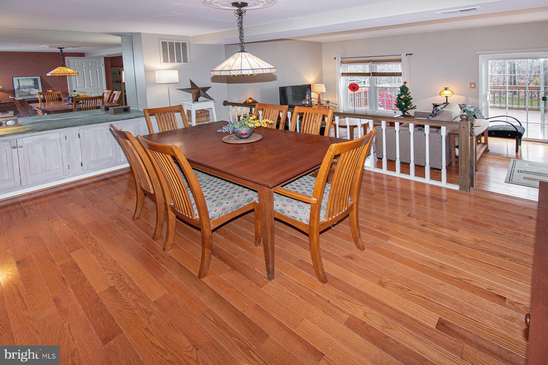 5619 Ridge View Drive Alexandria, VA 22310 - Photo 11 of 36 Hardwood flooring and built-in credenza complement