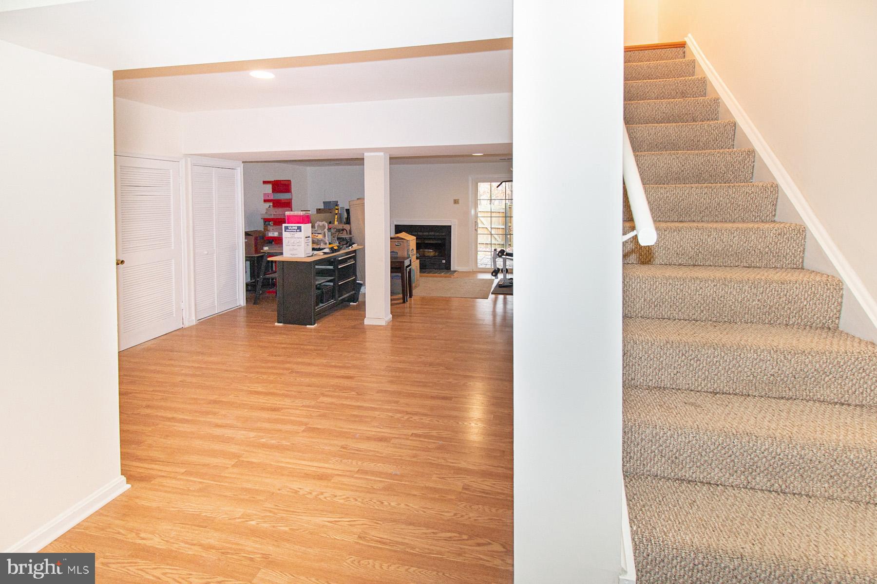 5619 Ridge View Drive Alexandria, VA 22310 - Photo 28 of 36 Head downstairs to the FR/bonus Rm/Laundry/Storage
