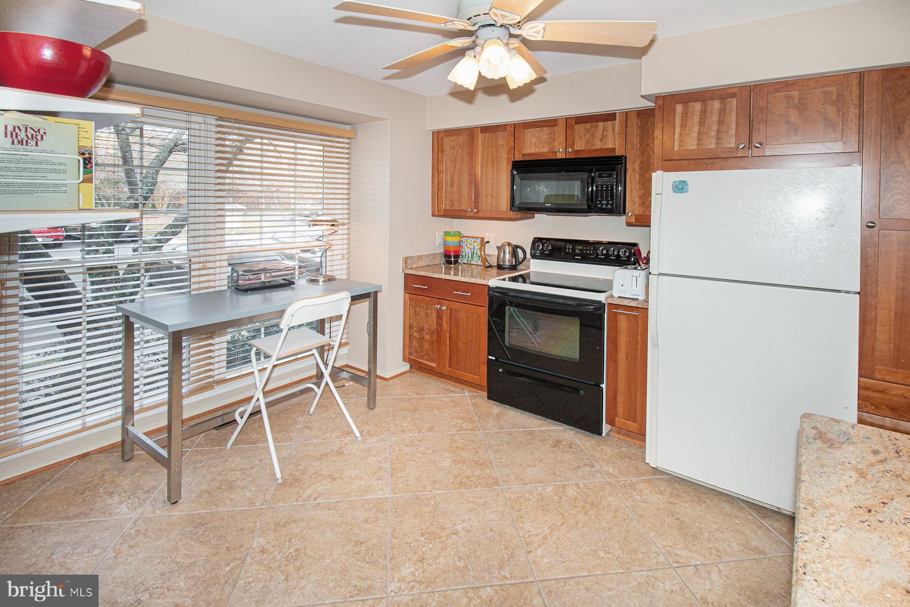 5619 Ridge View Drive Alexandria, VA 22310 - Photo 7 of 36 Tile flooring and ceiling fan enhance