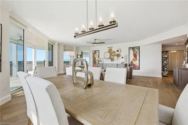 a large bedroom with a large bed and a large window