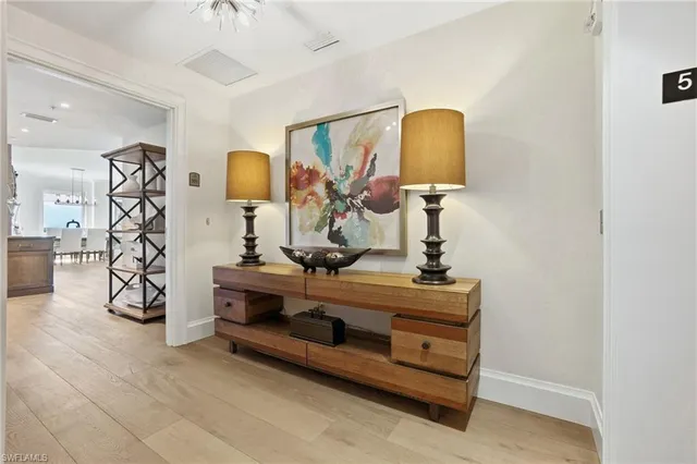 a view of a hallway with front door