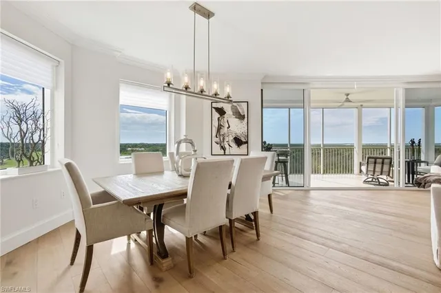 a kitchen with granite countertop a refrigerator stove and oven