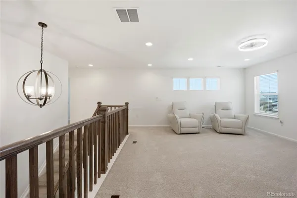 a very nice looking room with wooden floor