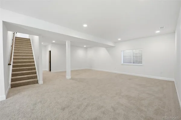 a view of an empty room with a projector