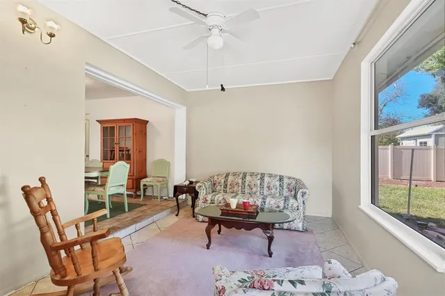 a bathroom with a sink a toilet a mirror a vanity and shower