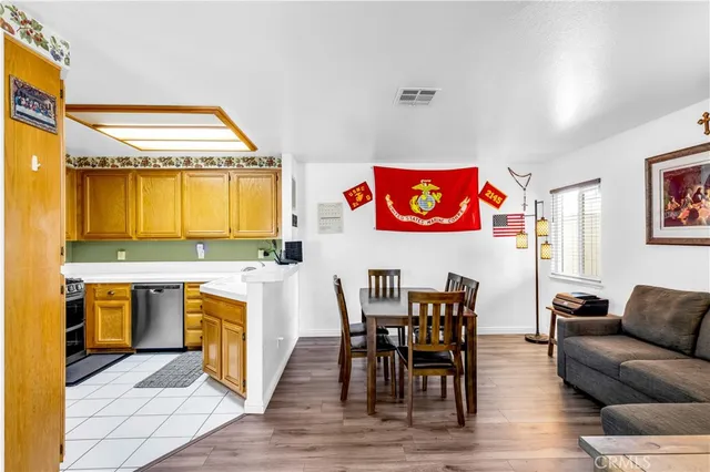 a view of kitchen with granite countertop breakfast area