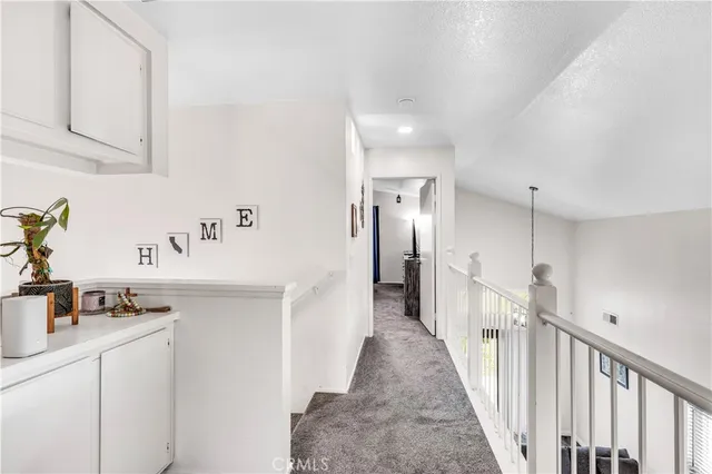 a view of a kitchen with a sink