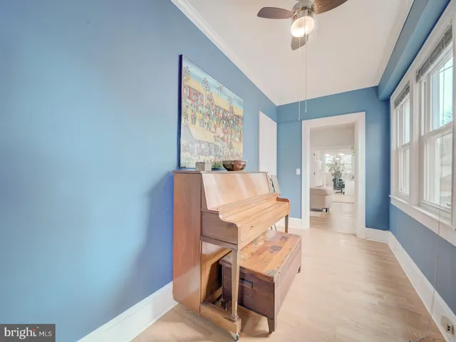 a bed room with a bed and a chandelier