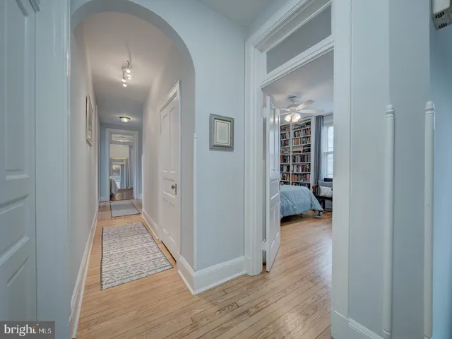 a view of a patio with couches and a fire pit