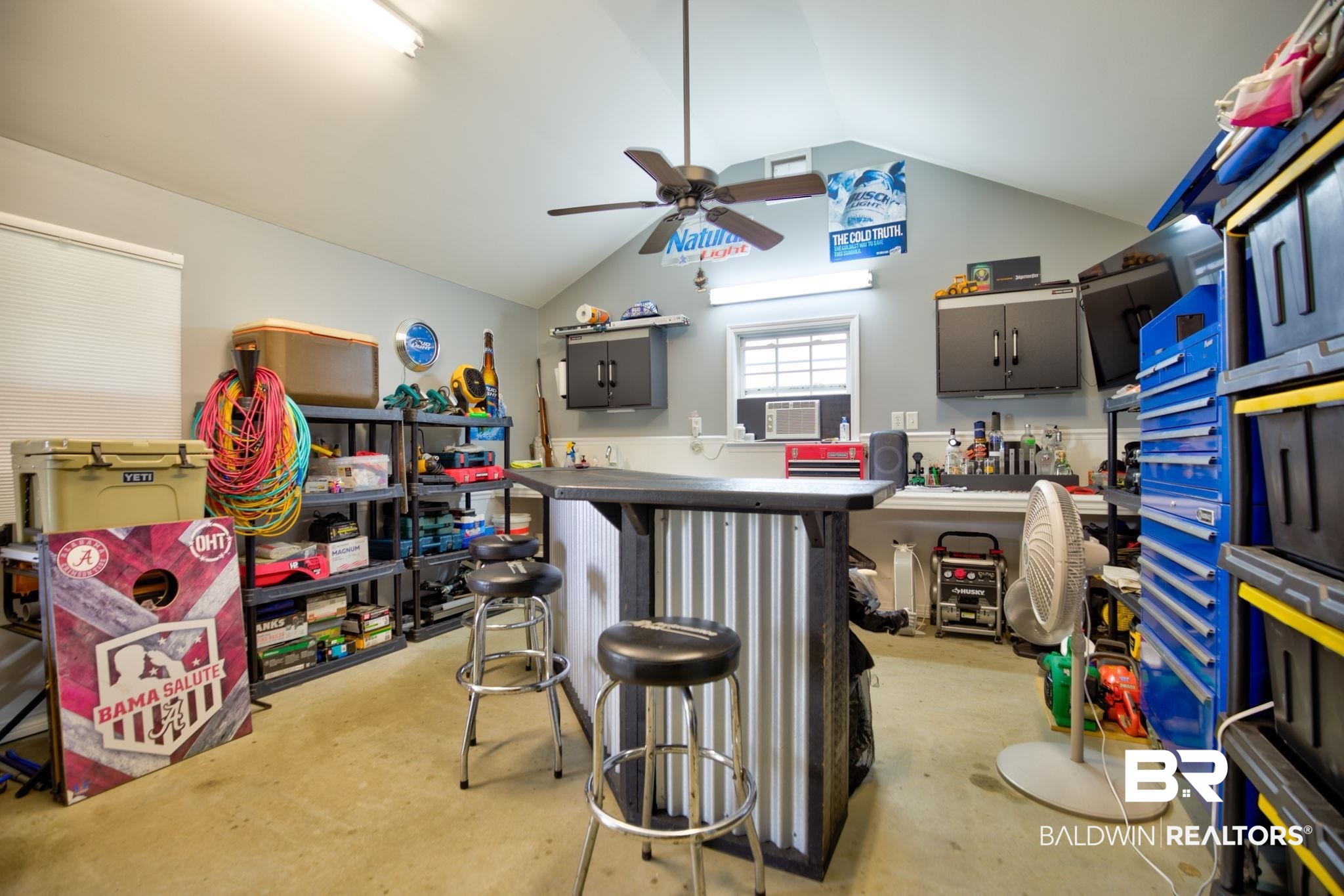 18732 Fairground Road Robertsdale, AL 36567 - Photo 46 of 46 Interior space featuring lofted ceiling, a breakfast bar area, and ceiling fan