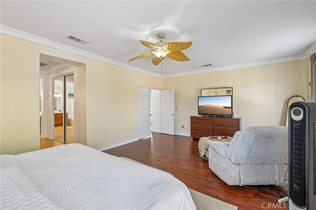 46101 Sharon Street Temecula, CA 92592 - Photo 21 of 34 a bedroom with a bed and a couch