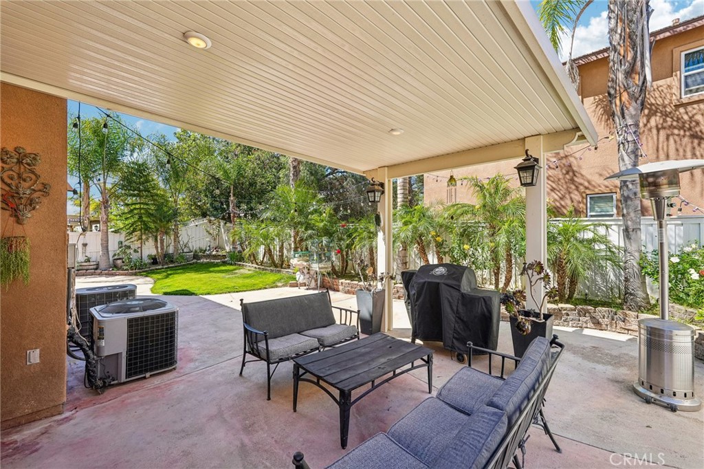 46101 Sharon Street Temecula, CA 92592 - Photo 28 of 34 a view of swimming pool with outdoor seating and plants