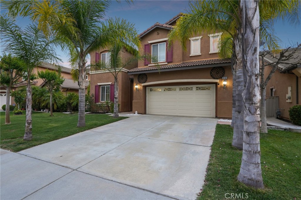 46101 Sharon Street Temecula, CA 92592 - Photo 3 of 34 a front view of house and yard with green space