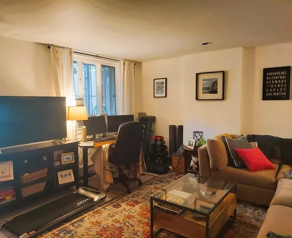 a view of a dinning table and chairs in the room