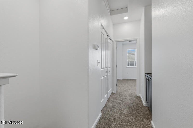 285 Mark Jeffrey Lane Reno, NV 89503 - Photo 17 of 20 a view of a hallway with wooden shelves