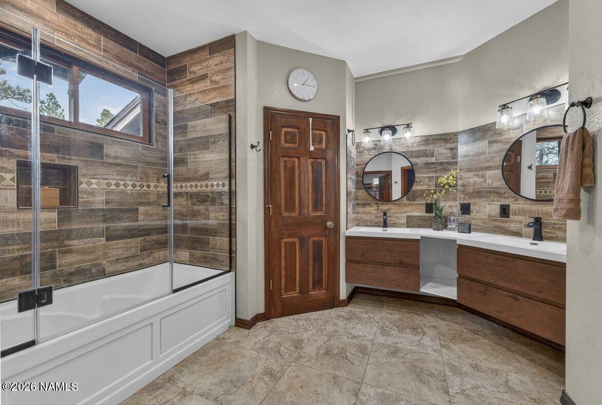 6135 East Abbey Road Flagstaff, AZ 86004 - Photo 16 of 48 Primary Suite Lower Level Bathroom is re