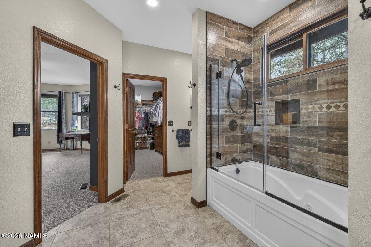 6135 East Abbey Road Flagstaff, AZ 86004 - Photo 17 of 48 Primary Suite Lower Level Bathroom