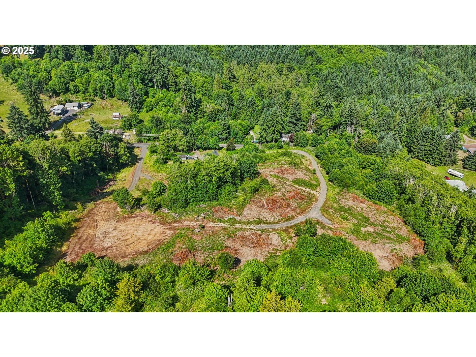1830 Hazel Dell Road, Unit LOT 4 Castle Rock, WA 98611 - Photo 26 of 37 a black and white photo of a house