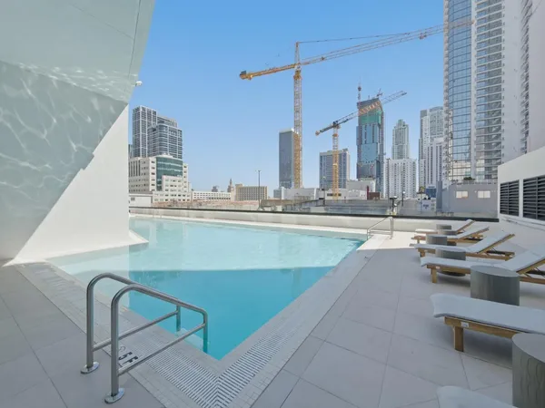 a view of a large building with a window