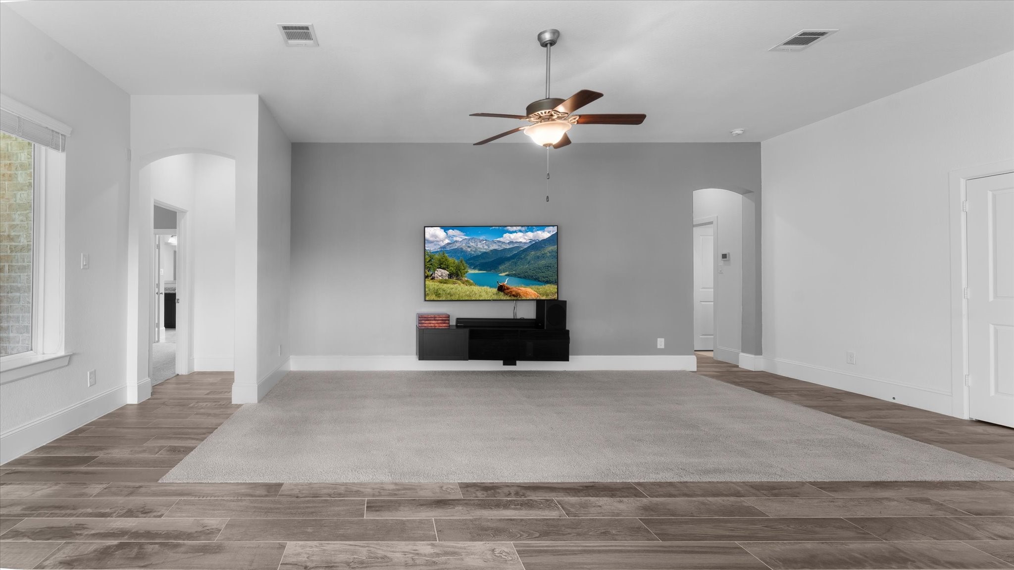 32001 Birch Briar Court Spring, TX 77386 - Photo 20 of 48 Spacious family room offering endless furniture layout options, abundant natural light, and an ideal space for entertaining.