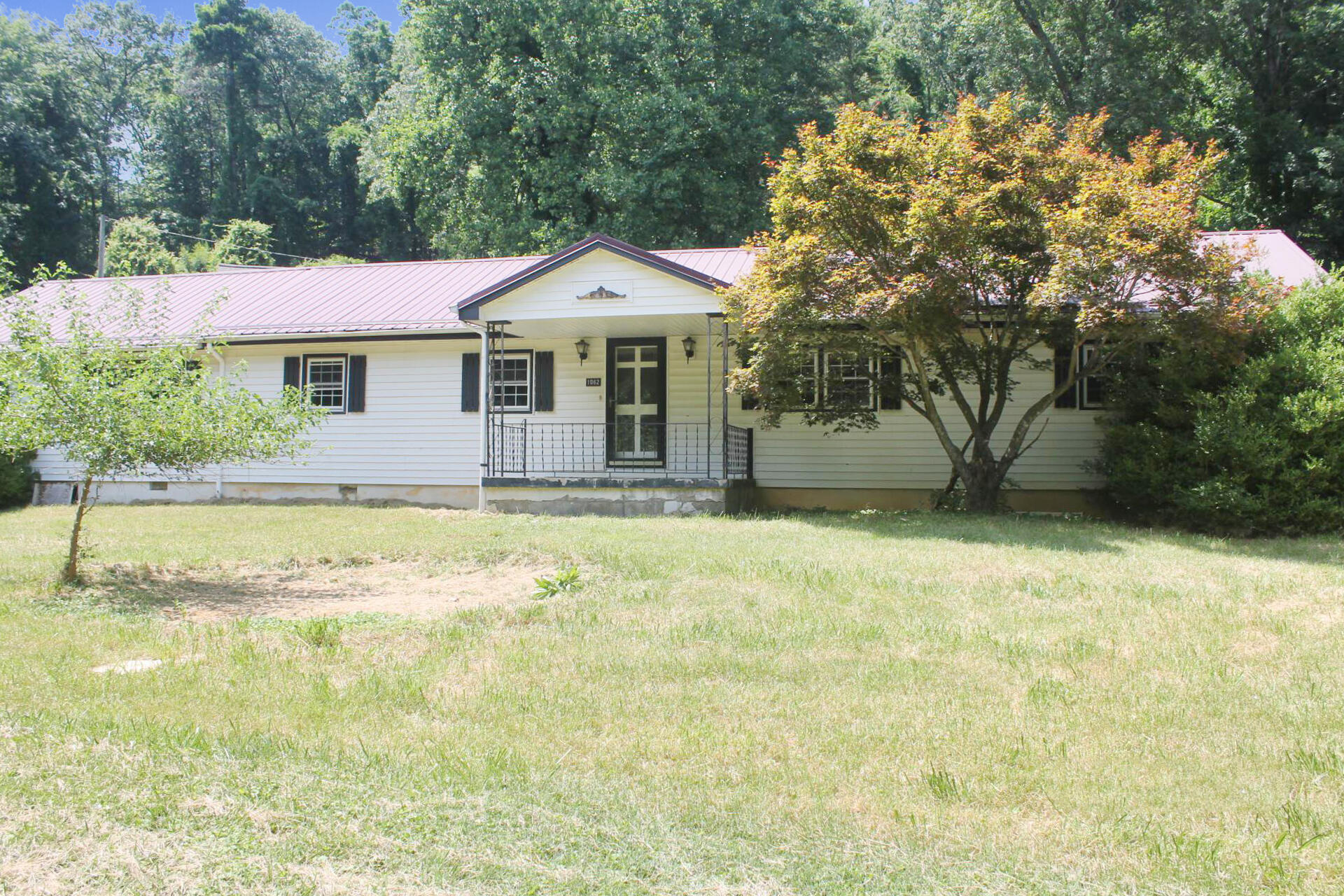 1062 Quartz Road Blue Ridge, VA 24064 - Photo 1 of 26 a front view of a house with a yard