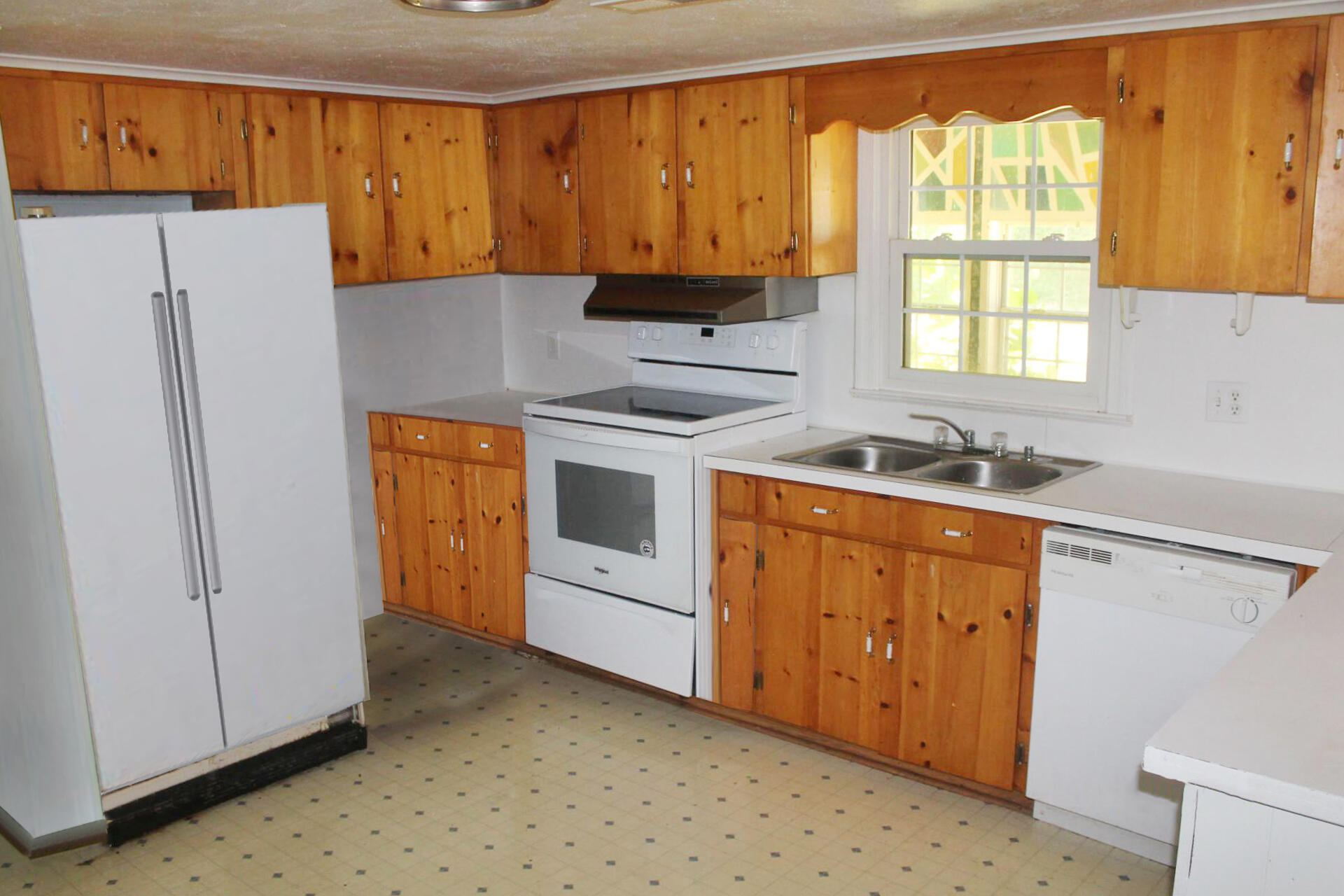 1062 Quartz Road Blue Ridge, VA 24064 - Photo 9 of 26 a kitchen with stainless steel appliances granite countertop a refrigerator and a stove