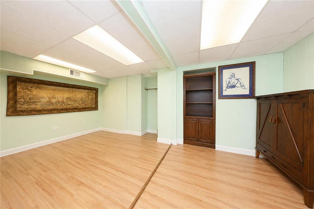 1 Bay Ridge Parkway Brooklyn, NY 11209 - Photo 28 of 38 a view of an empty room with wooden floor