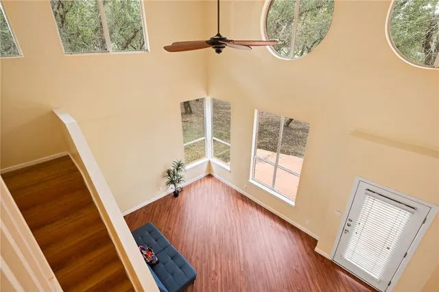 a view of an entryway with wooden floor