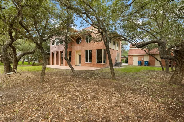 a house with trees in front of it