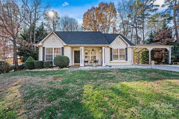 front view of a house with a yard