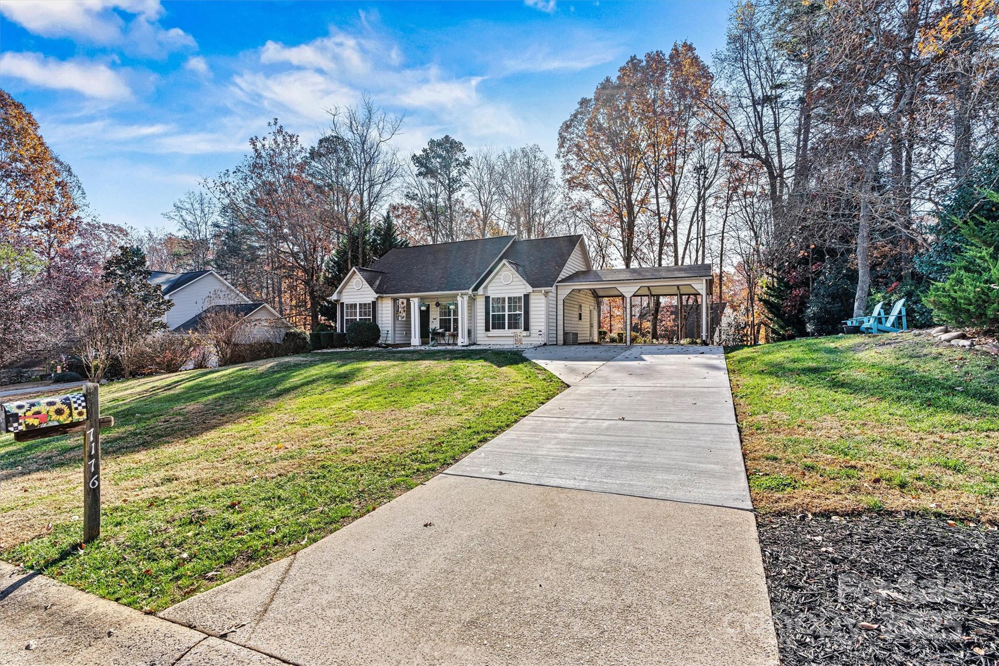 7176 Hunters Bluff Drive Denver, NC 28037 - Photo 2 of 36 front view of a house with a yard