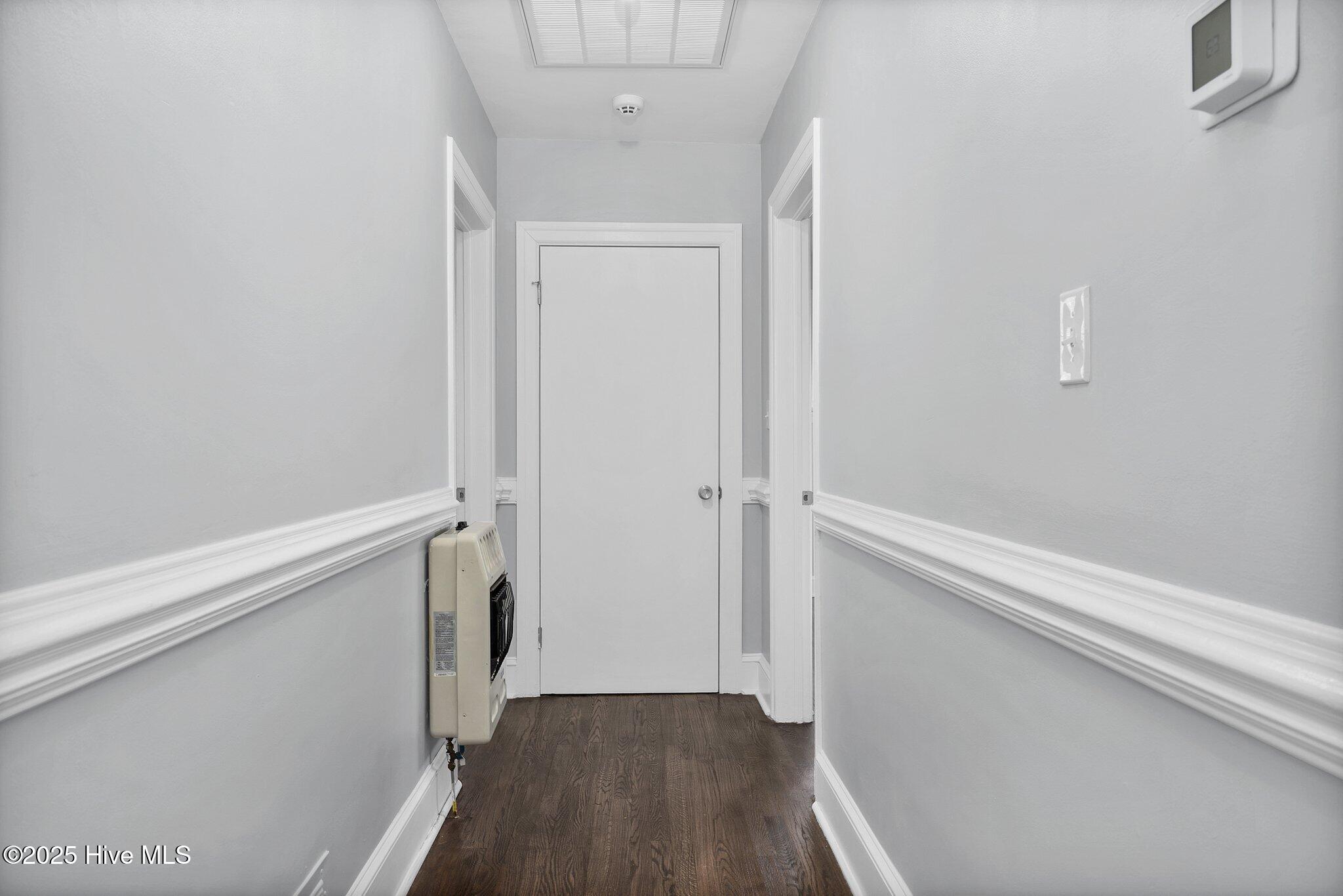 1245 Davistown-Mercer Road Pinetops, NC 27864 - Photo 36 of 40 Hardwoods through out the bedroom wing of the house. The hall has a working heater kept to provide for extra efficiency