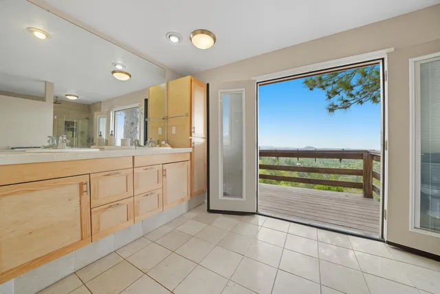 a backyard of a house with lots of green space