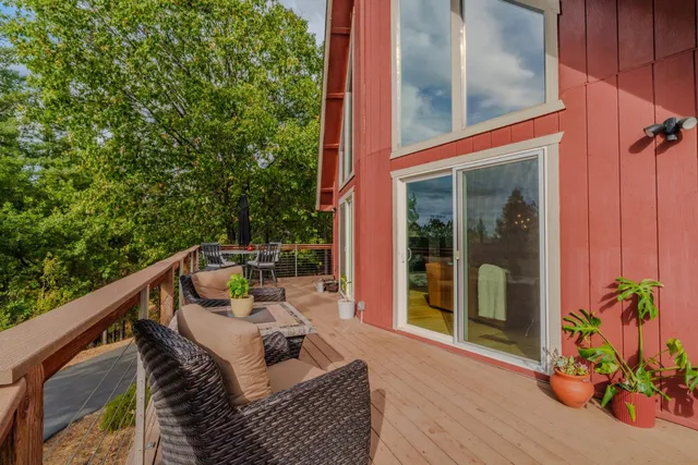a kitchen with stainless steel appliances granite countertop a sink and a stove
