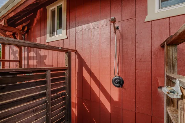 a kitchen with stainless steel appliances granite countertop a sink stove and microwave