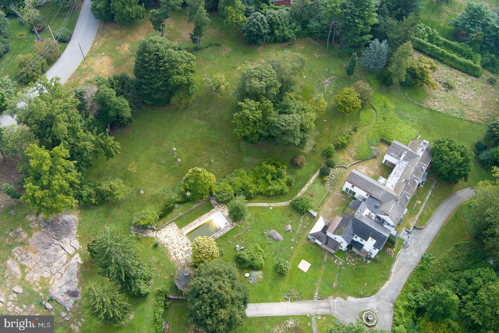 1425 Mt Pleasant Road Villanova, PA 19085 - Photo 3 of 5 an aerial view of residential houses with outdoor space and trees