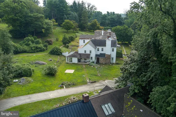 a view of a house with a big yard