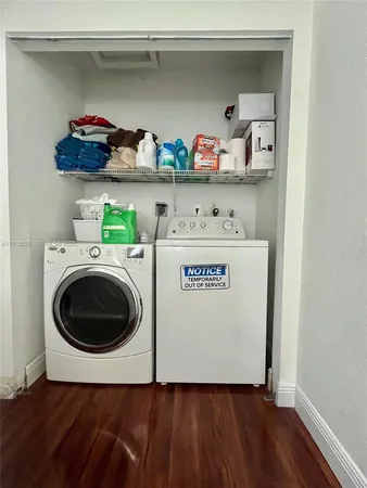 a utility room with dryer and washer