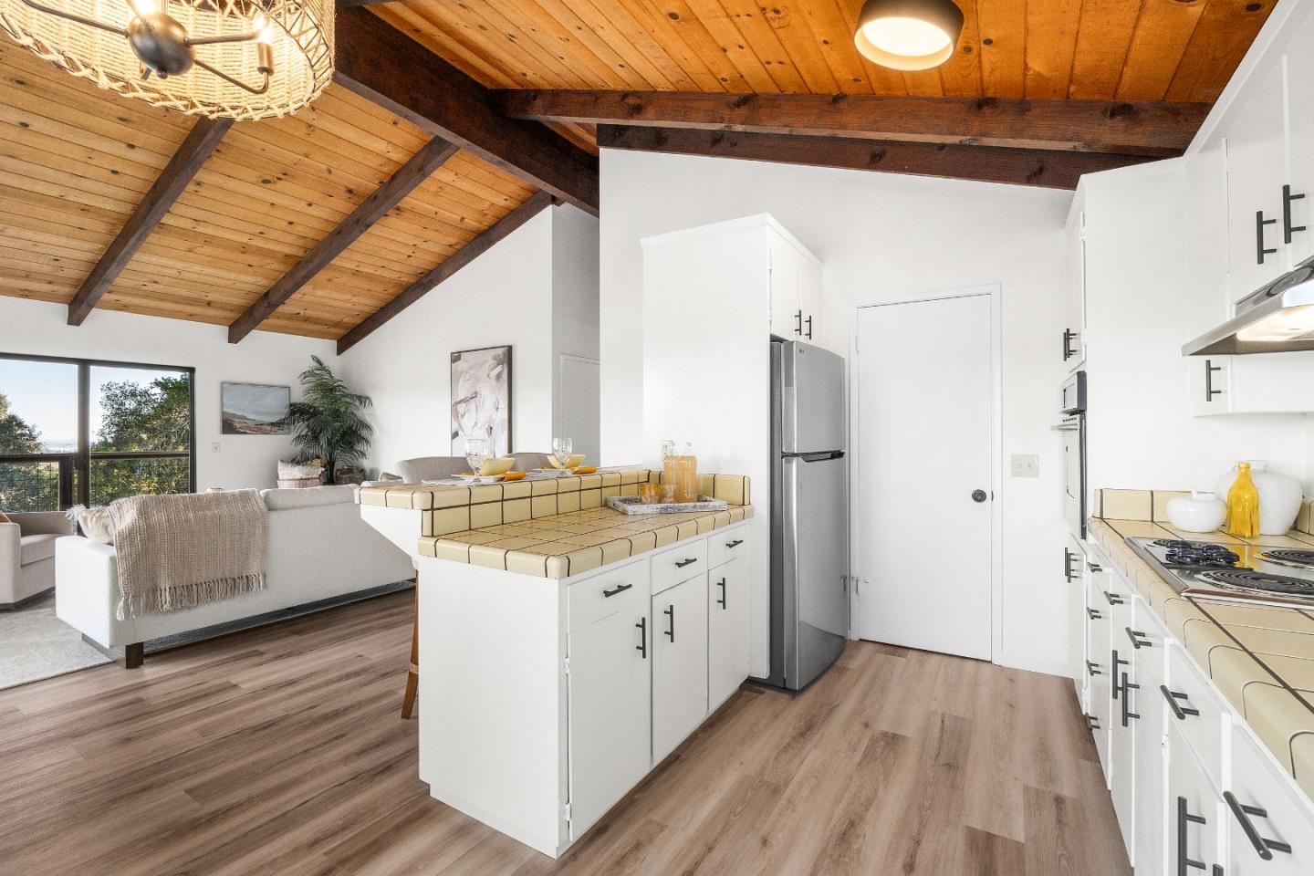 1130 Hidden Valley Road Soquel, CA 95073 - Photo 13 of 44 a kitchen with stainless steel appliances granite countertop a sink stove and refrigerator