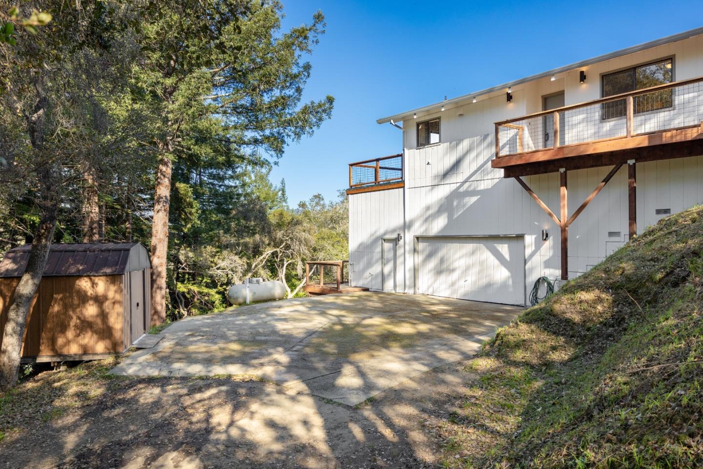 1130 Hidden Valley Road Soquel, CA 95073 - Photo 16 of 44 a view of a house with a large tree