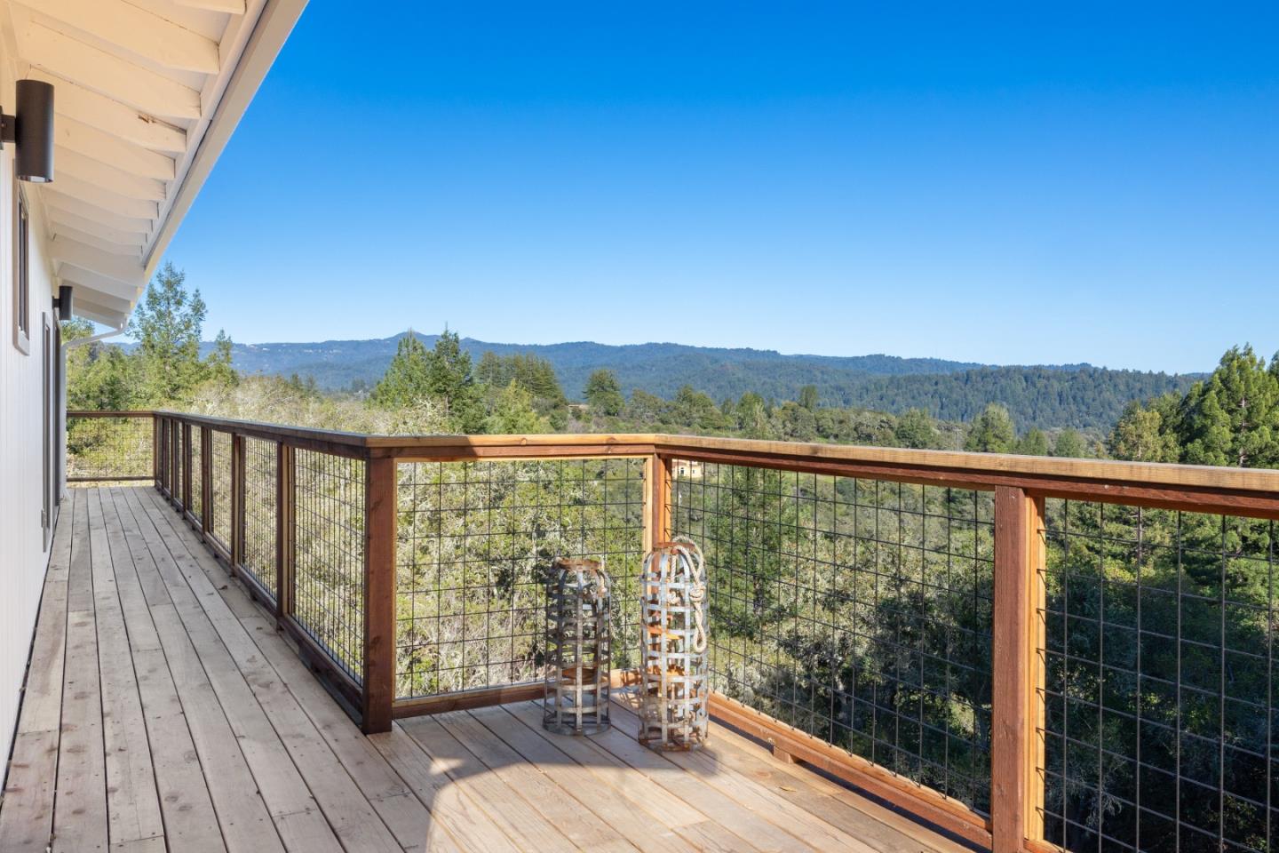 1130 Hidden Valley Road Soquel, CA 95073 - Photo 19 of 44 a view of a balcony with wooden floor and fence