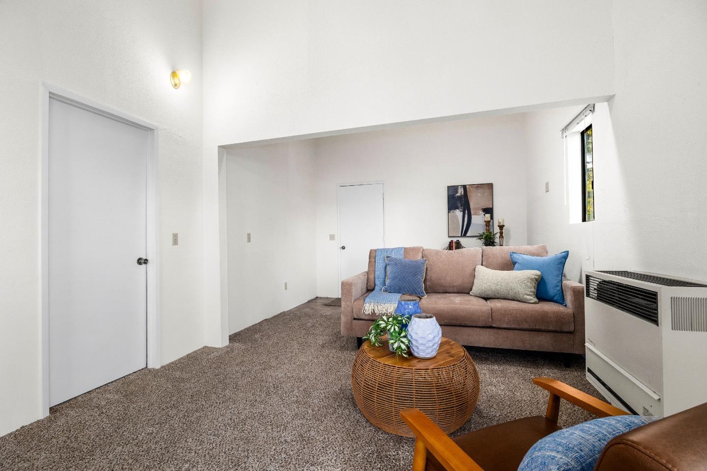 1130 Hidden Valley Road Soquel, CA 95073 - Photo 26 of 44 a living room with furniture and a window
