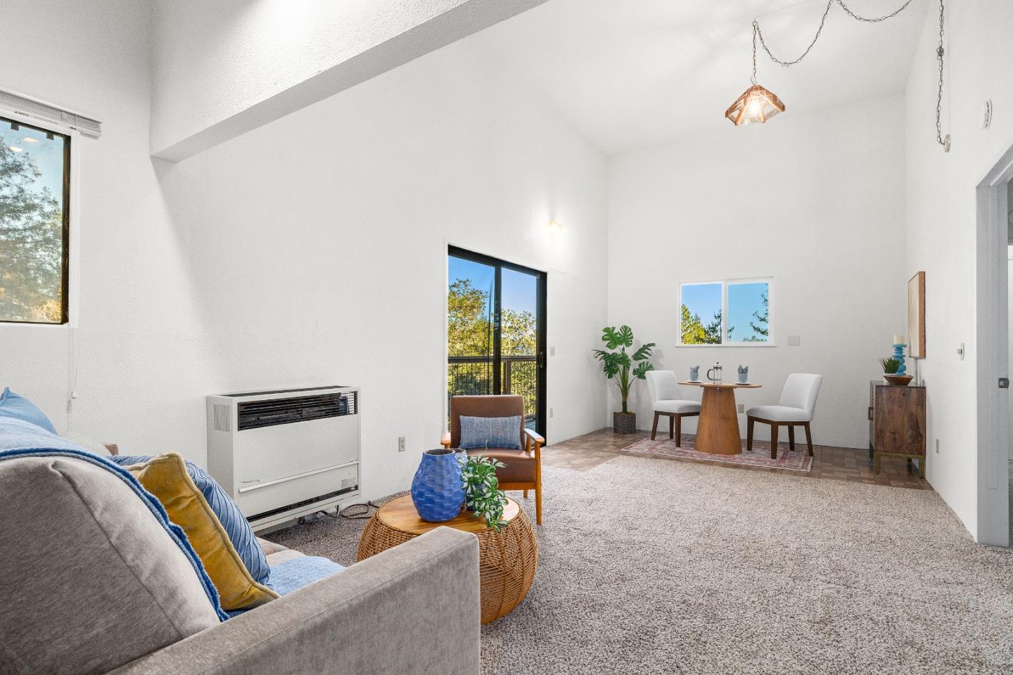 1130 Hidden Valley Road Soquel, CA 95073 - Photo 27 of 44 a living room with furniture and a window
