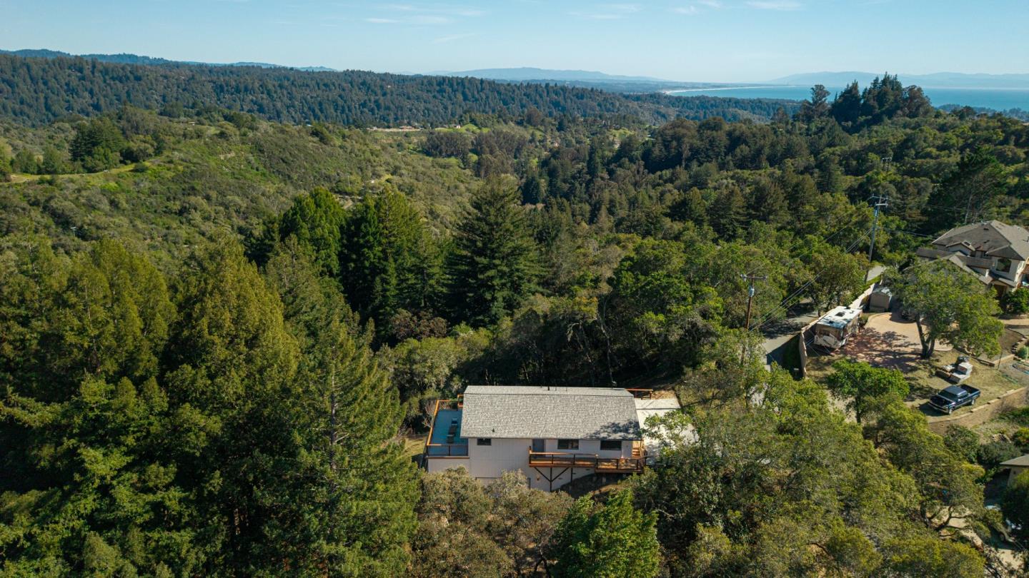 1130 Hidden Valley Road Soquel, CA 95073 - Photo 36 of 44 an aerial view of a house with a yard