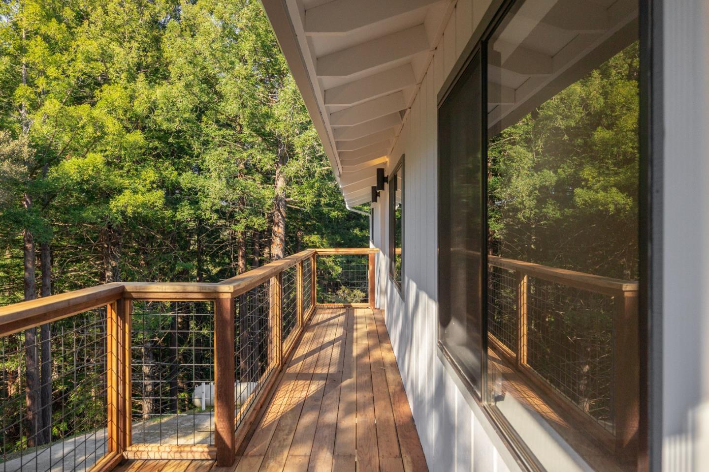 1130 Hidden Valley Road Soquel, CA 95073 - Photo 4 of 44 a view of balcony with wooden floor and fence