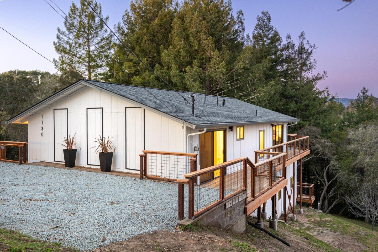 1130 Hidden Valley Road Soquel, CA 95073 - Photo 42 of 44 a house with trees in the background