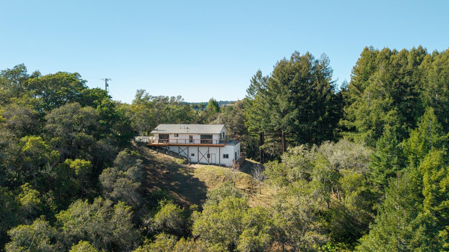 1130 Hidden Valley Road Soquel, CA 95073 - Photo 6 of 44 a view of a house with a yard