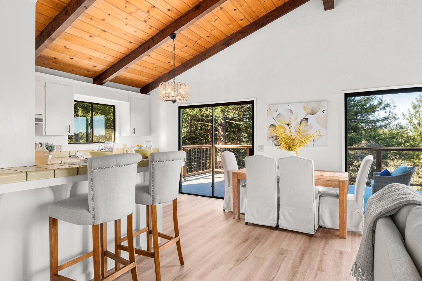 1130 Hidden Valley Road Soquel, CA 95073 - Photo 8 of 44 a dining room with furniture and wooden floor